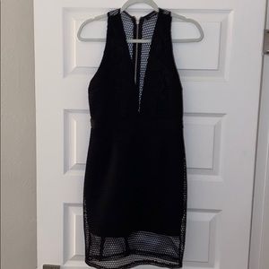 Black plunge neck mesh dress with lace details